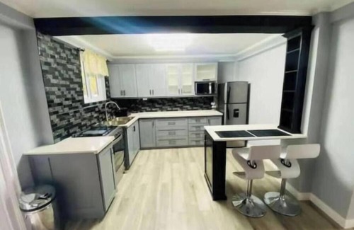 Orange Hill Apartment | Wonderful 4-bedroom combined apartment with AC in Carnbee