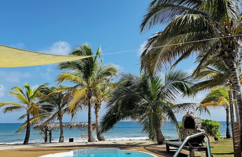 West End House | Secluded Sunsets 3400 Sq Ft Villa with 3 Separate Suites on the Ocean with Pool!