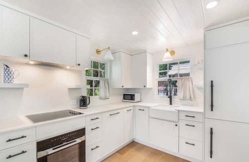 West Bay Cottage | Historic Boggy Sand Wood Cottage with Pool & Private Seven Mile Beach Access