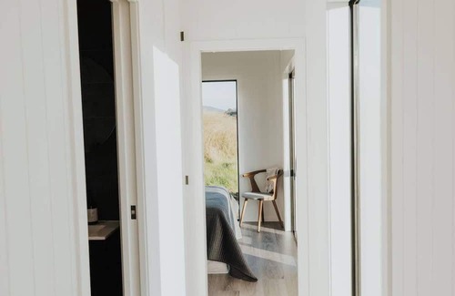Tawharanui Cabin | Omakana Cottage, Omakana Cottage with Farm Views & Cedar Hot Tub