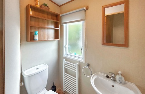 Burnham-on-Sea Apartment | Spacious caravan sleeps six, with private decking and master ensuite.