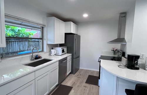 Chandler Park House | Spacious 5-bedroom pool house in Cape Canaveral with air hockey WiFi, AC