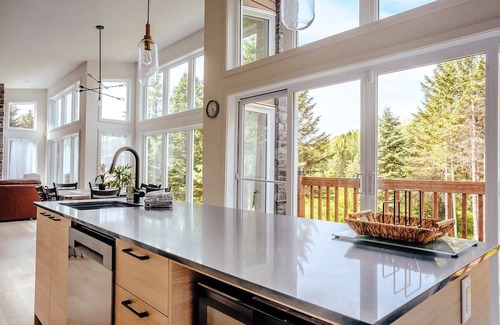 Riviere-Rouge House | Modern Waterfront Cottage on the Rouge River & Spa
