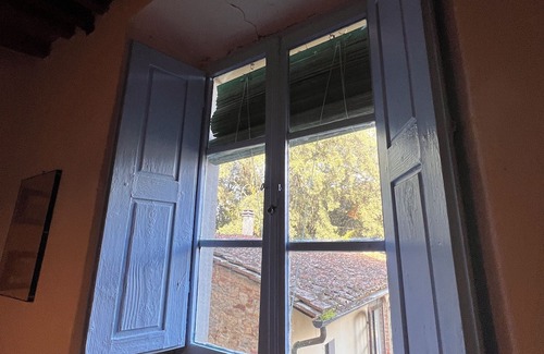 Pieve a Presciano Apartment | Apartment in hamlet with three large rooms and pool use
