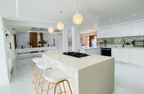 Santiago de los Caballeros Villa | Pastel Room Chef & Pool in the Mansion