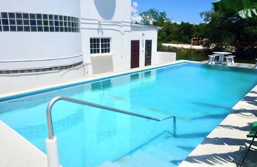 Belize City Apartment | See Belize SEABREEZE Sea View Studio with Balcony, Pool & Overwater Deck, 2nd FL