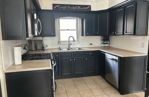 Norton Shores House | Charming bedroom in house in beautiful Norton Shores