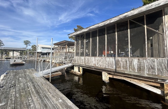 The Crow’s Nest. Waterfront Keaton Beach Park Model, private dock, pole barn