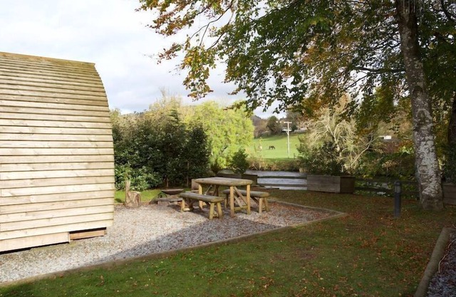 A premium wigwam with hot tub that sleeps 4 guests, 2 adults are included.