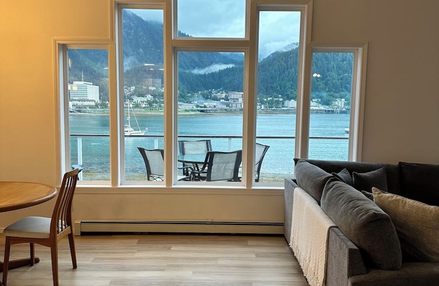 Spacious beachfront retreat with views of Gastineau Channel and downtown Juneau.