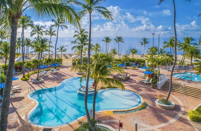 Have Fun at this Beachfront Paradise with Outdoor Pools, Free Parking!
