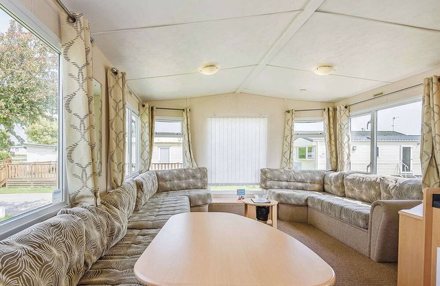 Comfortable 12ft-wide caravan with one double and two twin.