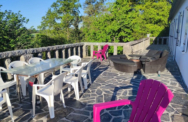 Tree oasis. Large terrace overlooking lake and forest.