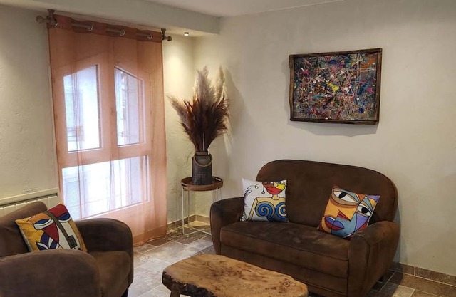 Warm, designer apartment in town center between lake and mountains