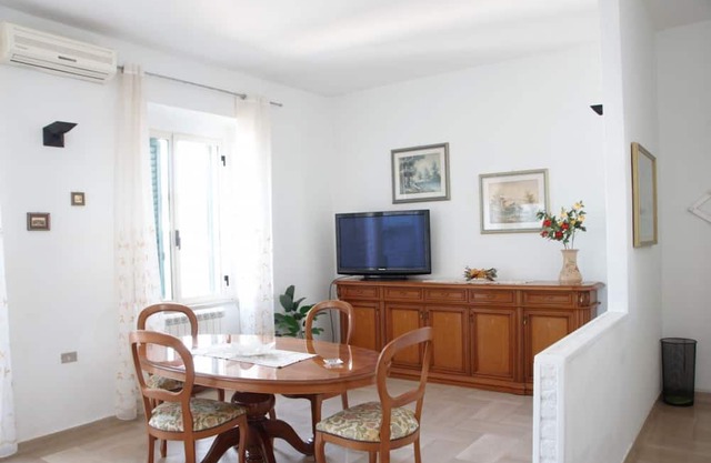 Comfortable 75 sqm apartment, accommodating up to 3 people, located on the second floor of a building without an elevator.The property is located in Grumo Appula, a typical inland village in Puglia, rich in history and equipped with every comfort and ser