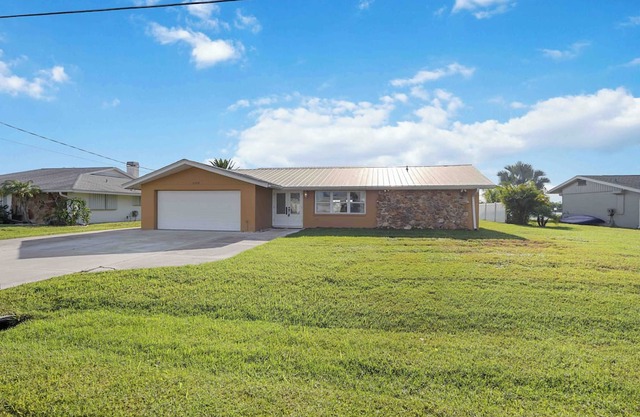Coastal Luxury awaits in this 3/3 on the River