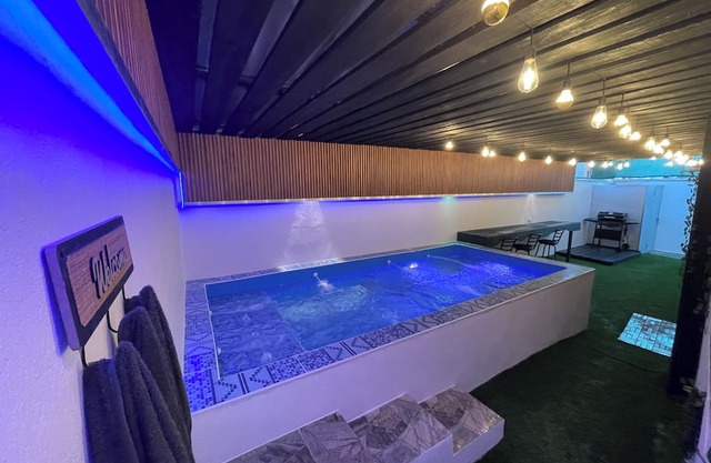 Tremendous 2-bedroom house with a private pool, office, and private parking.