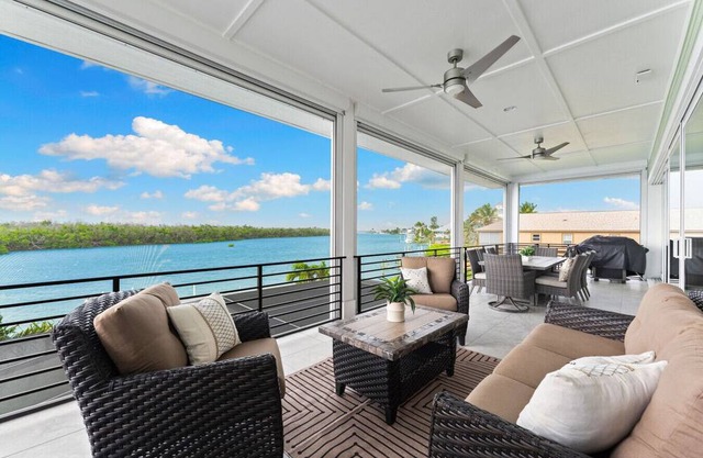 Seafoam Serenity - Bayfront Retreat w/Dock, Pool & 1 Min Walk to Bonita Beach