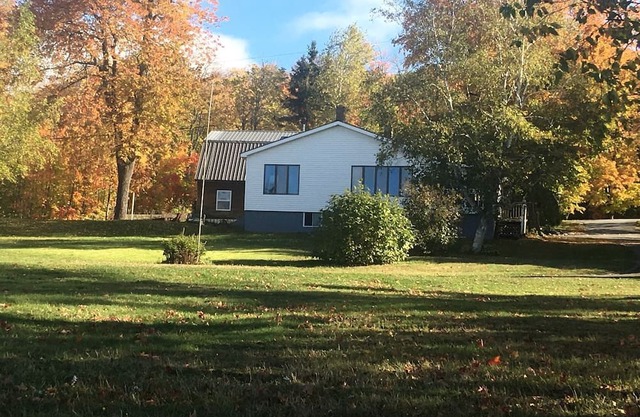 Embrace Nature in this Breathtaking Cottage in Portage Lake, Maine