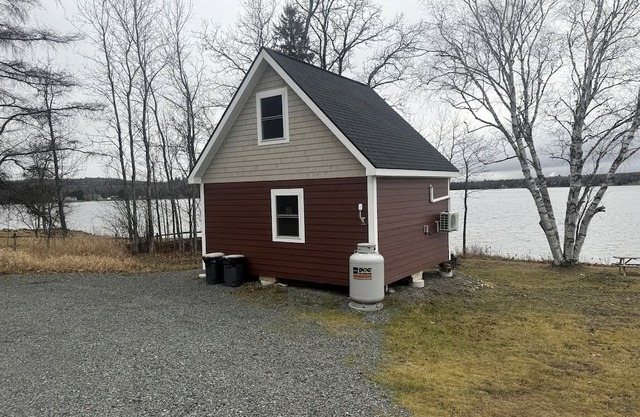 Magnificent Cabin Nestled Amidst Trees in Portage Lake, Maine