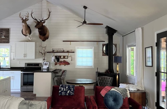 Cabin on secluded horse farm with stocked pond.