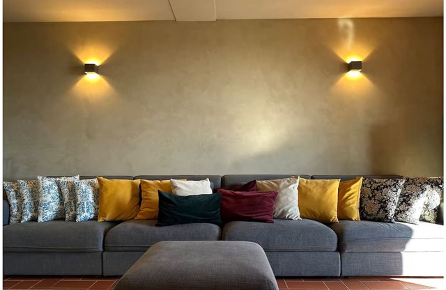 An oasis of peace and warmth of home, amidst thoughtful design and views toward the hills.