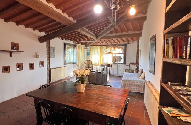Penthouse with large windows and frescoes in hamlet with pool use