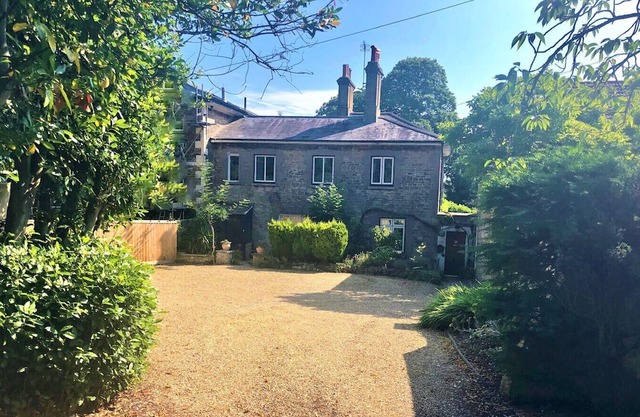 Adjoining dog-friendly stone cottages with gardens and parking