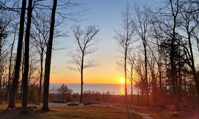 Sturgeon Bay Cabin | Water view on a bluff- Bay side with hot tub