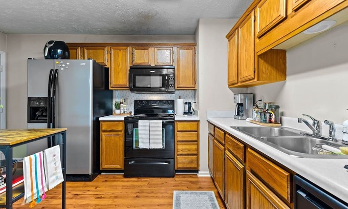 Pine Forest House | Cozy Boho Bedroom in Superb Fayetteville Location