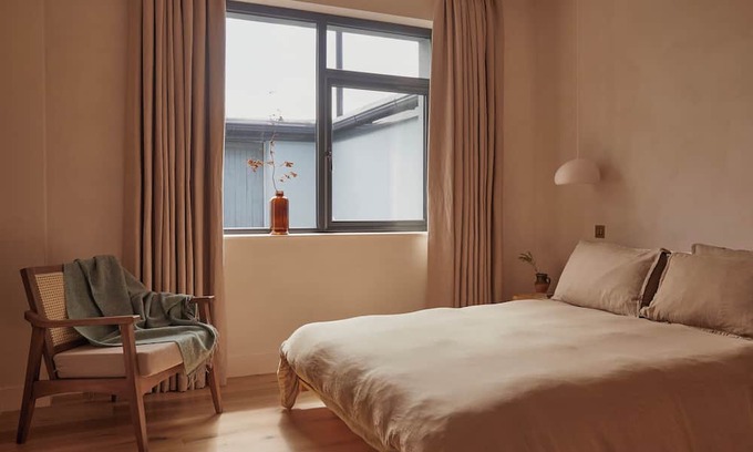 Ballycastle Apartment | Yarn - Honor is a spacious luxury suite king size bed, bathroom & living/kitchen