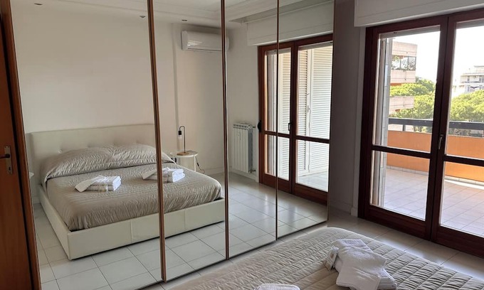 Quartiere XX Ardeatino Apartment | Sole House at 6th floor with terrace, near the station to the city center