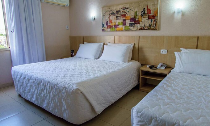 Foz do Iguacu City Centre Hotel | Laugh, Relax & Explore Together in a Large Triple Room by Iguazu Park