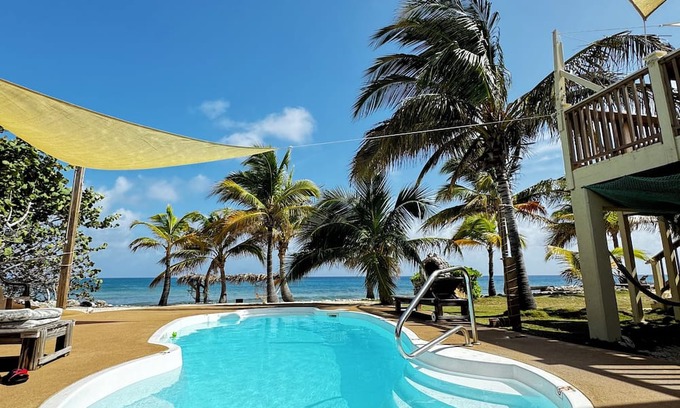 West End House | Secluded Sunsets 3400 Sq Ft Villa with 3 Separate Suites on the Ocean with Pool!
