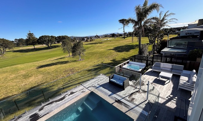 Mount Maunganui House | Family Paradise - 2 dwellings, Golf course views and beach across the road.