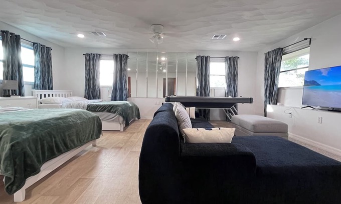 Chandler Park House | Spacious 5-bedroom pool house in Cape Canaveral with air hockey WiFi, AC