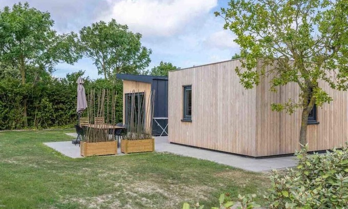 Scharendijke House | Welcome to Muralt 111, a modern chalet with everything for a carefree stay. Enjoy the cozy living ro