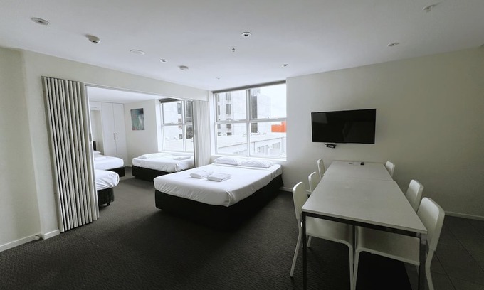 Carlton South Apartment | Large City Apartment for 6 Guests | Melbourne CBD | Free Wi-Fi & On Site Parking